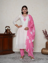 Off-white cotton suit with pink embroidered neckline