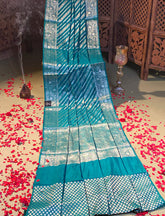 Teal green leharia crepe silk saree