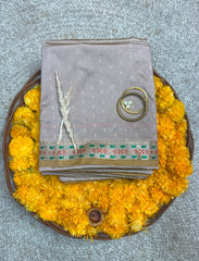 Silver grey crepe silk saree with minakari work